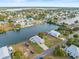 Aerial view of a waterfront home with a large backyard at 3340 Oleander Dr, Hernando Beach, FL 34607