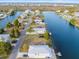 Large waterfront lot with two-story house and private dock at 3340 Oleander Dr, Hernando Beach, FL 34607