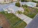 Elevated view of waterfront home with large yard and boat at 3340 Oleander Dr, Hernando Beach, FL 34607