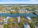 An aerial view of a waterfront home with a spacious lot at 3340 Oleander Dr, Hernando Beach, FL 34607