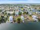 Aerial view of waterfront home with private dock and expansive lot at 3340 Oleander Dr, Hernando Beach, FL 34607