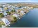 Spacious waterfront property with a two-story house and private dock at 3340 Oleander Dr, Hernando Beach, FL 34607