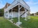 Elevated home with open parking area under at 3340 Oleander Dr, Hernando Beach, FL 34607