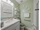 Clean bathroom with modern vanity and walk-in shower at 3340 Oleander Dr, Hernando Beach, FL 34607