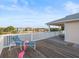 Spacious deck overlooking the water with lounge chairs at 3340 Oleander Dr, Hernando Beach, FL 34607