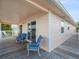 Relaxing deck with patio furniture overlooking the water at 3340 Oleander Dr, Hernando Beach, FL 34607