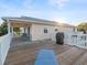 Large deck with seating area and grill, offering water views at 3340 Oleander Dr, Hernando Beach, FL 34607