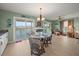 Bright dining area with water views and a glass table at 3340 Oleander Dr, Hernando Beach, FL 34607