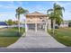 Two-story home with attached garage and waterfront access at 3340 Oleander Dr, Hernando Beach, FL 34607