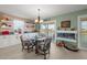 Bright eat-in kitchen with white cabinets, granite counters, and water views at 3340 Oleander Dr, Hernando Beach, FL 34607