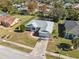 Single-Gathering home with landscaped yard and paved driveway, seen from above at 3470 Cedar Crest Loop, Spring Hill, FL 34609