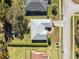 Aerial view of a single Gathering home with a large backyard at 3470 Cedar Crest Loop, Spring Hill, FL 34609