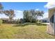 Spacious backyard offering a large grassy area at 3470 Cedar Crest Loop, Spring Hill, FL 34609