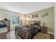 Cozy bedroom with a double bed and dinosaur theme decor at 3470 Cedar Crest Loop, Spring Hill, FL 34609