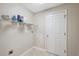 Laundry room with shelving and a door to the outside at 3470 Cedar Crest Loop, Spring Hill, FL 34609