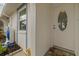 Front door and entryway with religious statue and garden at 4231 Richmere Dr # 3D, New Port Richey, FL 34652