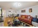 Bright living room with hardwood floors and comfortable seating at 4231 Richmere Dr # 3D, New Port Richey, FL 34652