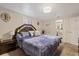 Main bedroom with ensuite bathroom and large bed at 4231 Richmere Dr # 3D, New Port Richey, FL 34652