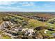 Aerial view of clubhouse and golf course at 4886 Westchester Ct, Oldsmar, FL 34677