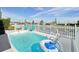 Inviting refreshing pool with a floating raft, perfect for relaxation at 5102 Blue Heron Dr, New Port Richey, FL 34652