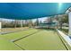 Two bocce ball courts with shade structure and benches at 7302 Melogold Cir, Land O Lakes, FL 34637