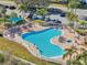 Relaxing community pool with hot tub and patio area at 7302 Melogold Cir, Land O Lakes, FL 34637