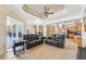 Open living space with access to the kitchen and backyard at 7302 Melogold Cir, Land O Lakes, FL 34637