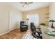 Home office with two chairs and a work desk at 7302 Melogold Cir, Land O Lakes, FL 34637