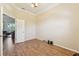 Home office with wood floors and access to other rooms at 7302 Melogold Cir, Land O Lakes, FL 34637