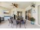 Outdoor patio with seating area, adjacent to the pool at 7302 Melogold Cir, Land O Lakes, FL 34637