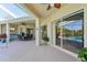 Covered patio with pool access and outdoor seating at 7302 Melogold Cir, Land O Lakes, FL 34637