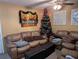 Relaxing living room featuring a comfortable leather sectional sofa at 8278 Silverbell Loop, Brooksville, FL 34613