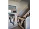 Stairwell with a pet gate and key holder at 8278 Silverbell Loop, Brooksville, FL 34613
