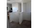 Upstairs hallway with carpeted floors and white walls at 8278 Silverbell Loop, Brooksville, FL 34613