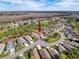 Aerial view showcasing the home's setting within a neighborhood at 9519 Green Needle Dr, New Port Richey, FL 34655