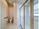 Bathroom with toilet and shower stall at 9519 Green Needle Dr, New Port Richey, FL 34655