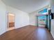 Bright bedroom with wood flooring and ensuite bathroom at 9519 Green Needle Dr, New Port Richey, FL 34655