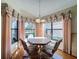 Cozy breakfast nook with view to backyard at 9519 Green Needle Dr, New Port Richey, FL 34655