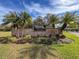 Entrance to Timber Greens at Oak Pine Village community at 9519 Green Needle Dr, New Port Richey, FL 34655