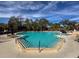 Inviting community pool perfect for relaxation and recreation at 9519 Green Needle Dr, New Port Richey, FL 34655