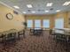 Community room with tables and chairs, perfect for gatherings at 9519 Green Needle Dr, New Port Richey, FL 34655