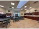 Large gathering space with kitchen facilities and tables at 9519 Green Needle Dr, New Port Richey, FL 34655