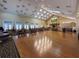 A large room with hardwood floors, perfect for dancing at 9519 Green Needle Dr, New Port Richey, FL 34655