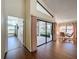 Hallway with access to enclosed patio and other rooms at 9519 Green Needle Dr, New Port Richey, FL 34655