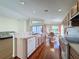Kitchen with light wood cabinets, stainless steel appliances and hardwood floors at 9519 Green Needle Dr, New Port Richey, FL 34655