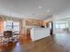 Kitchen with breakfast nook and view to living room at 9519 Green Needle Dr, New Port Richey, FL 34655