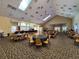 Spacious hall with tables and dance floor, ideal for events at 9519 Green Needle Dr, New Port Richey, FL 34655