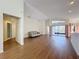 Open living area with sliding glass doors and hardwood floors at 9519 Green Needle Dr, New Port Richey, FL 34655
