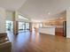Open living area with kitchen and access to a patio at 9519 Green Needle Dr, New Port Richey, FL 34655