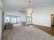 Bright living room with hardwood and carpeted floors at 9519 Green Needle Dr, New Port Richey, FL 34655